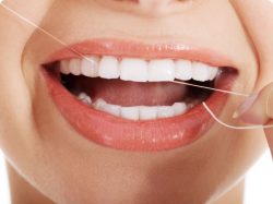 Qual e melhor maneira de usar o fio dental?